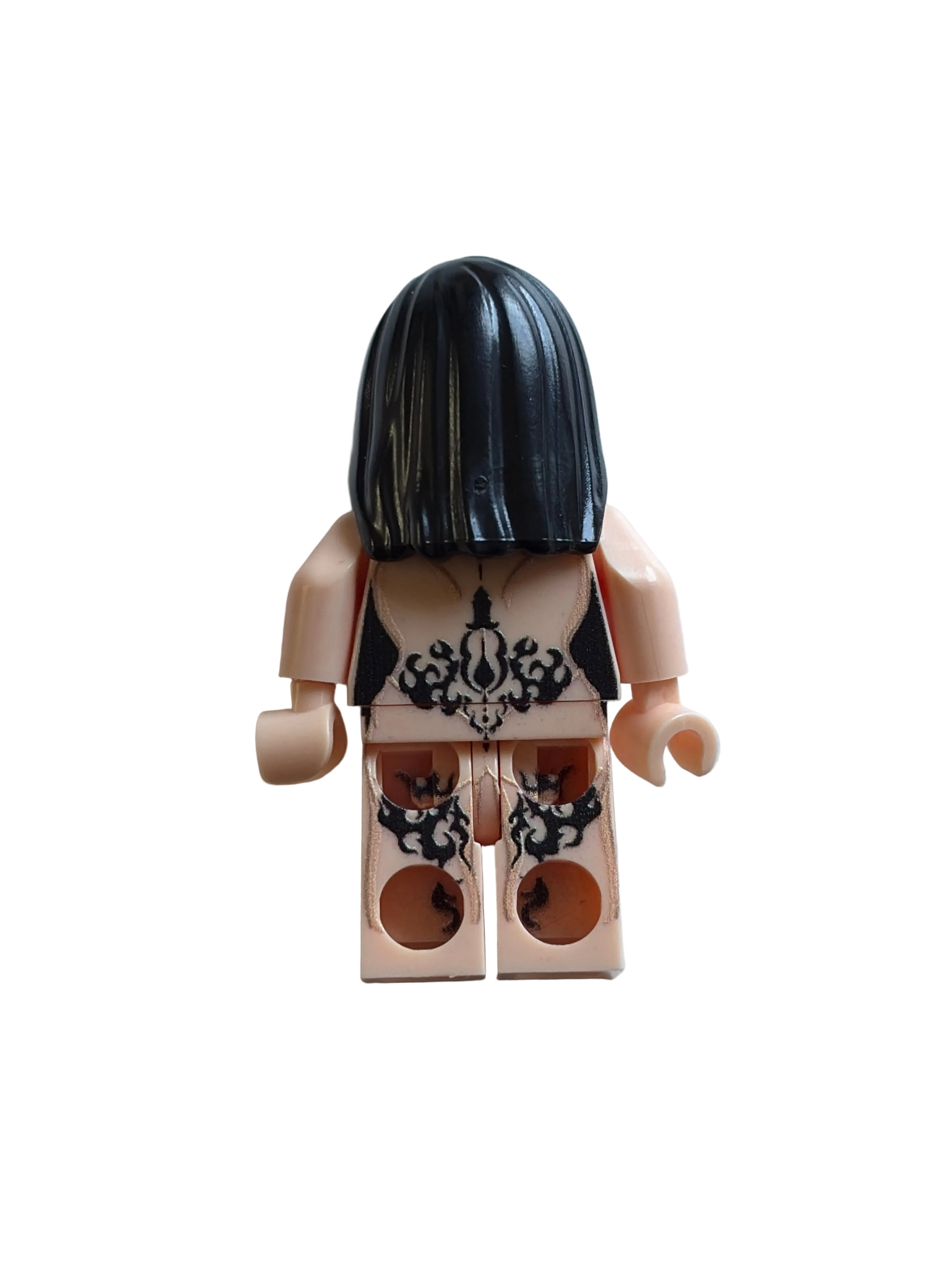 A custom-built toy minifigure torso with a black hair dome, beige skin, and a black-and-white patterned shirt, shown on a light gray background.
