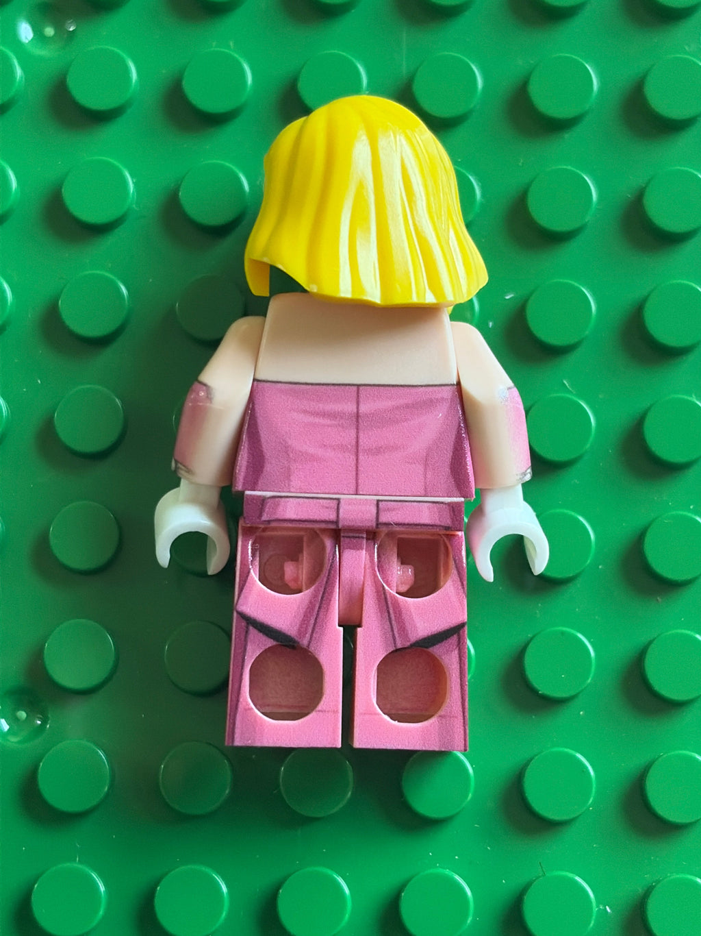 Madonna minifigure in pink dress off the shoulders from vogue music video. 