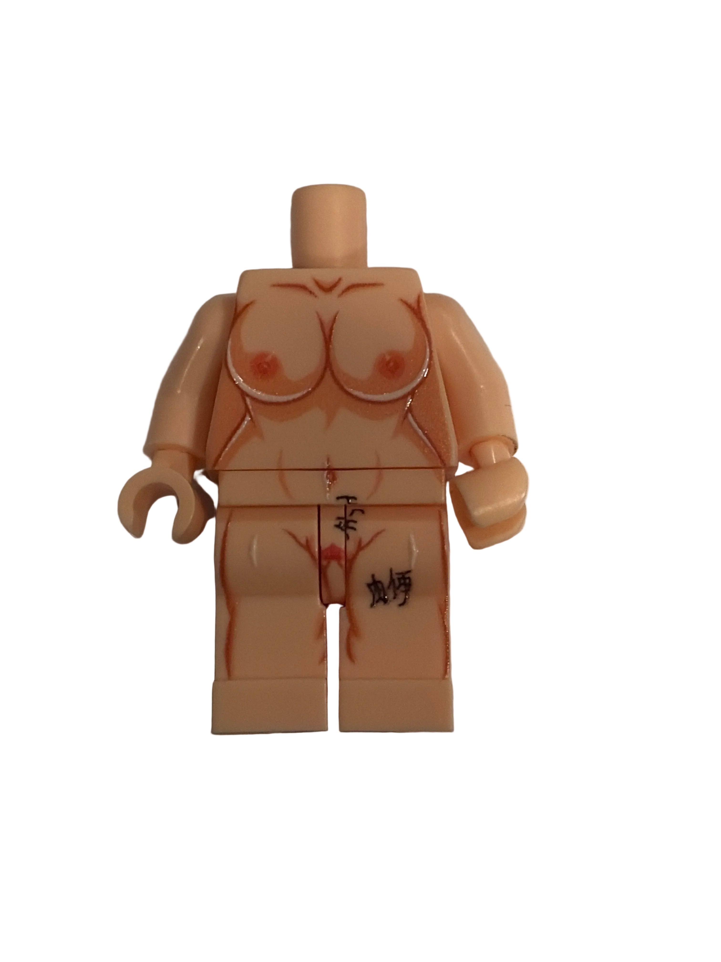 Beige Lego figure torso with floral design on a white background