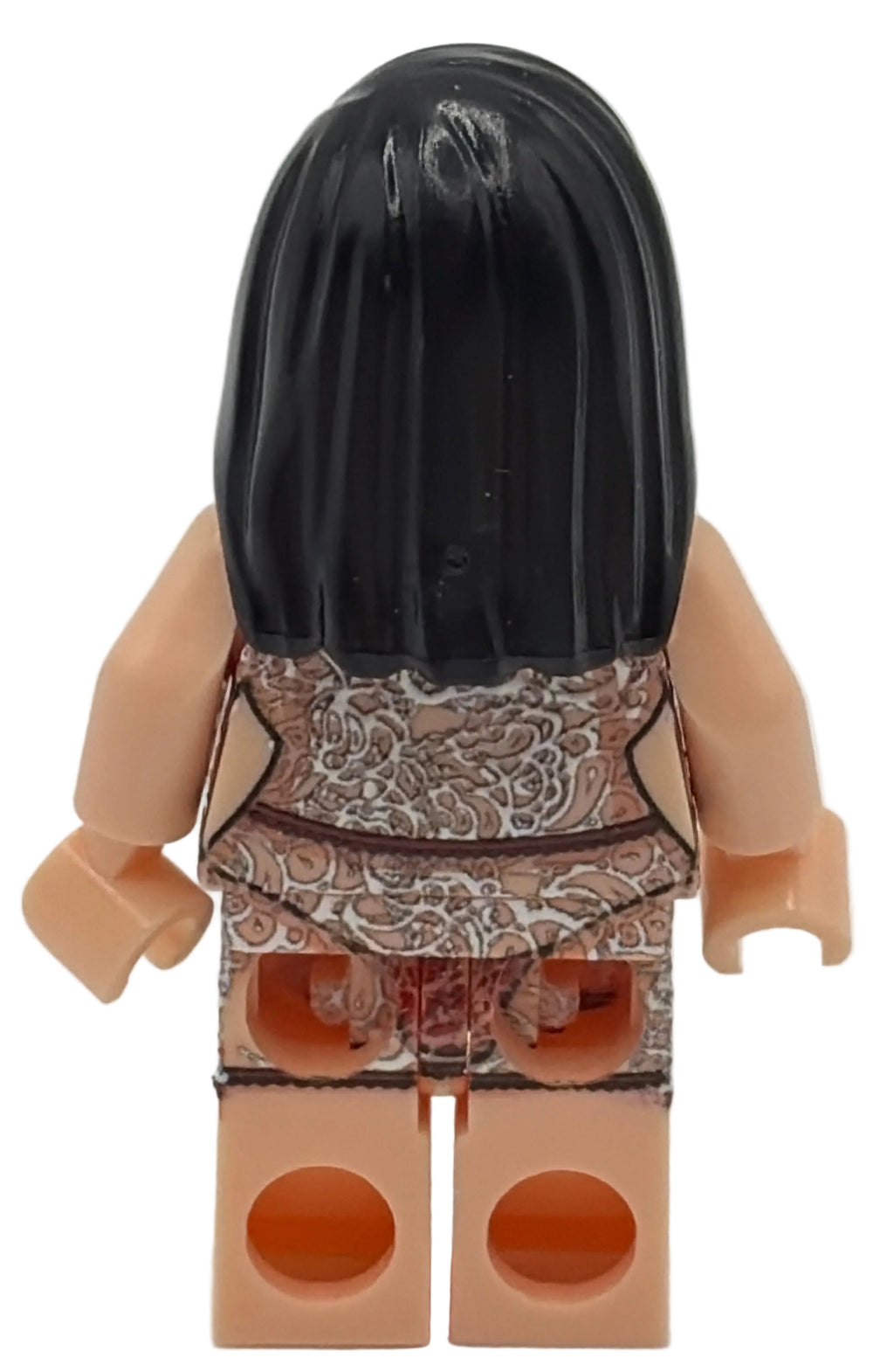 Toy figure with a black head and beige body on a white background