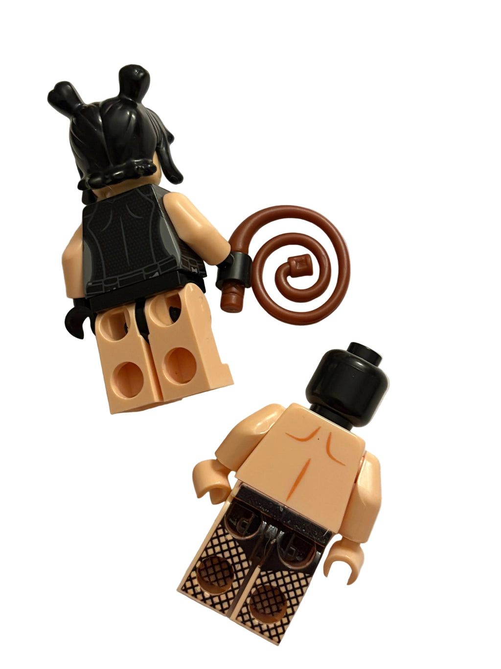 Pink minifigures legs and torso on a white background with whip