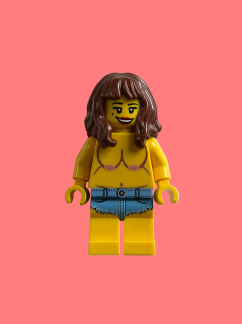 Lego minifigure with brown hair, yellow torso, yellow legs, and blue Daisy Duke shorts