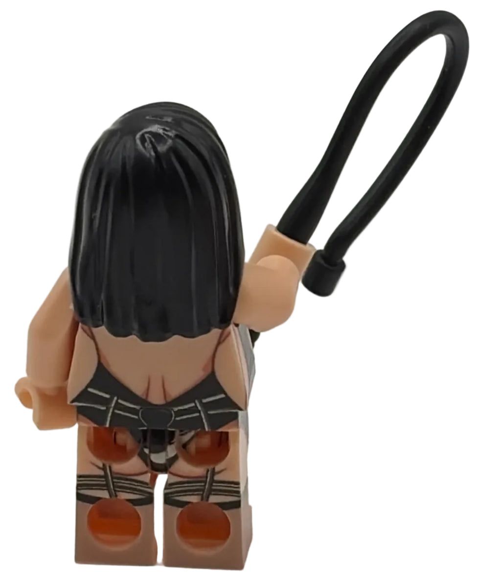 Figurine with black hair and a box on a white background
