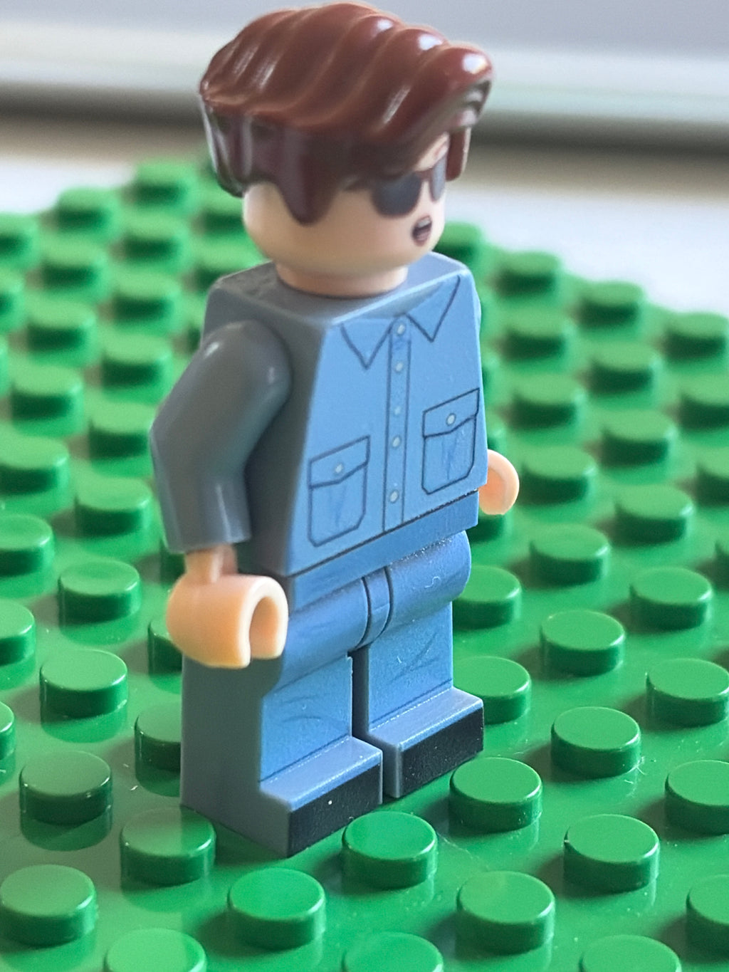 Rick Astley minifigure with outfit from Never gonna give you up music video. 