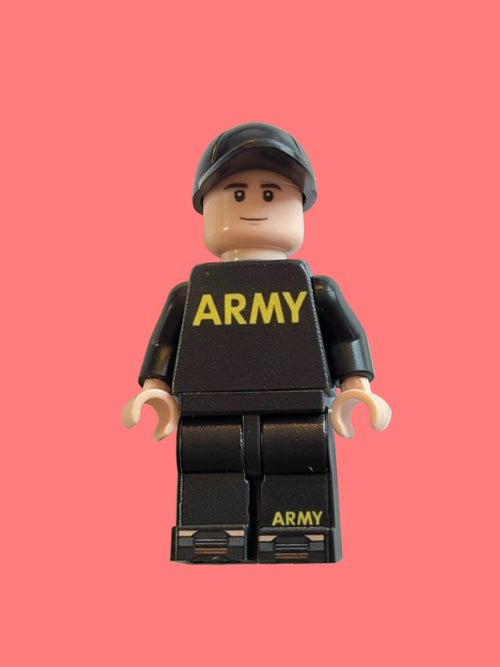 A custom toy minifigure dressed in a black tactical uniform with 'ARMY' printed in yellow on the chest and legs, wearing a black helmet. The figure has a beige plastic head and hands, standing against a plain off-white background.