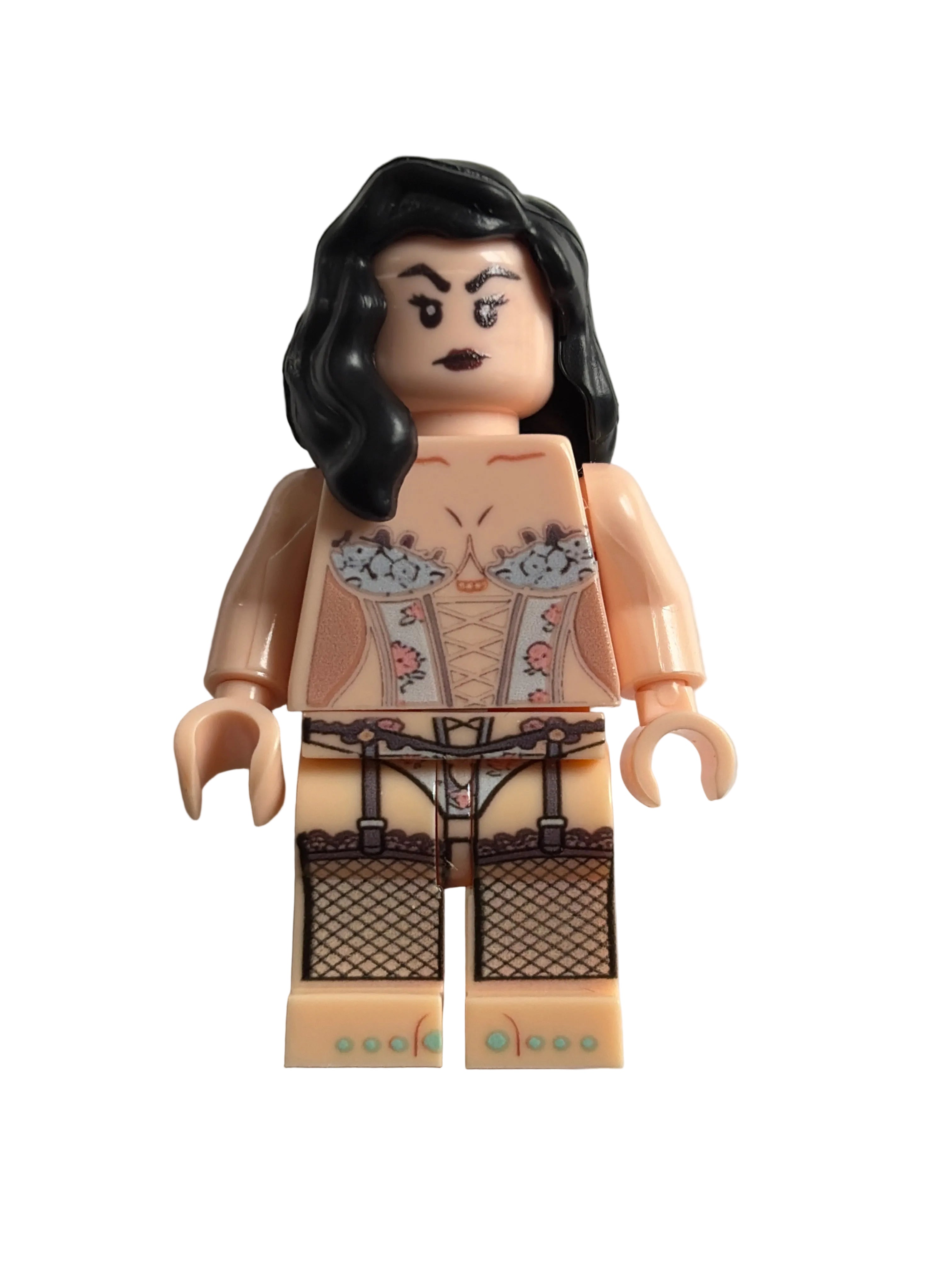 A custom-built LEGO minifigure of a woman with black hair, wearing a beige corset top with floral patterns and black lace-up stockings, set against a plain light gray background.