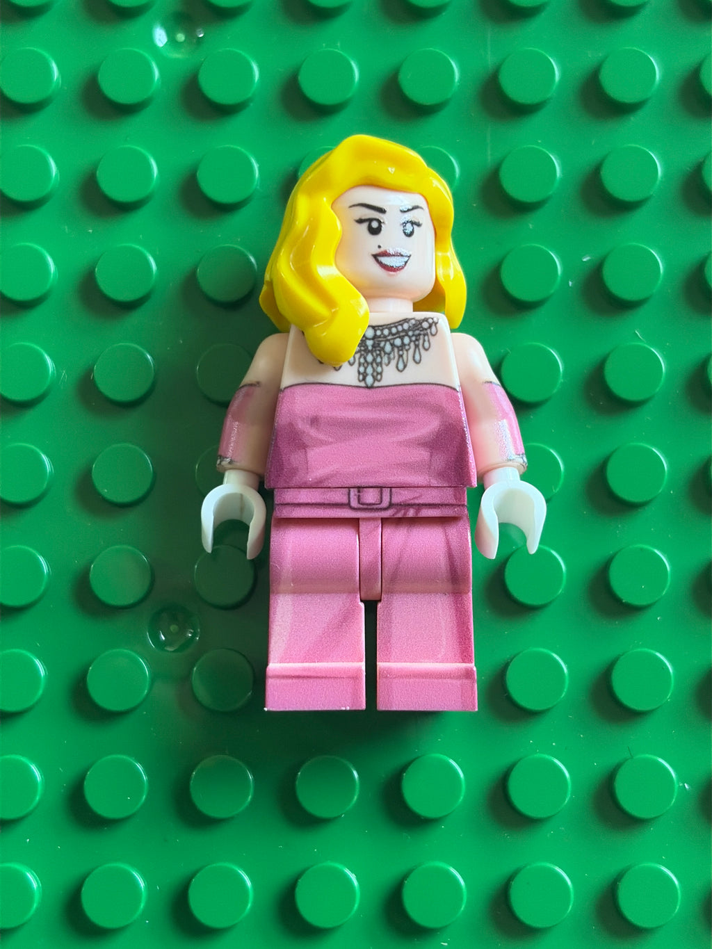 Madonna in pink off the shoulder dress from
the music video for the song vogue front view