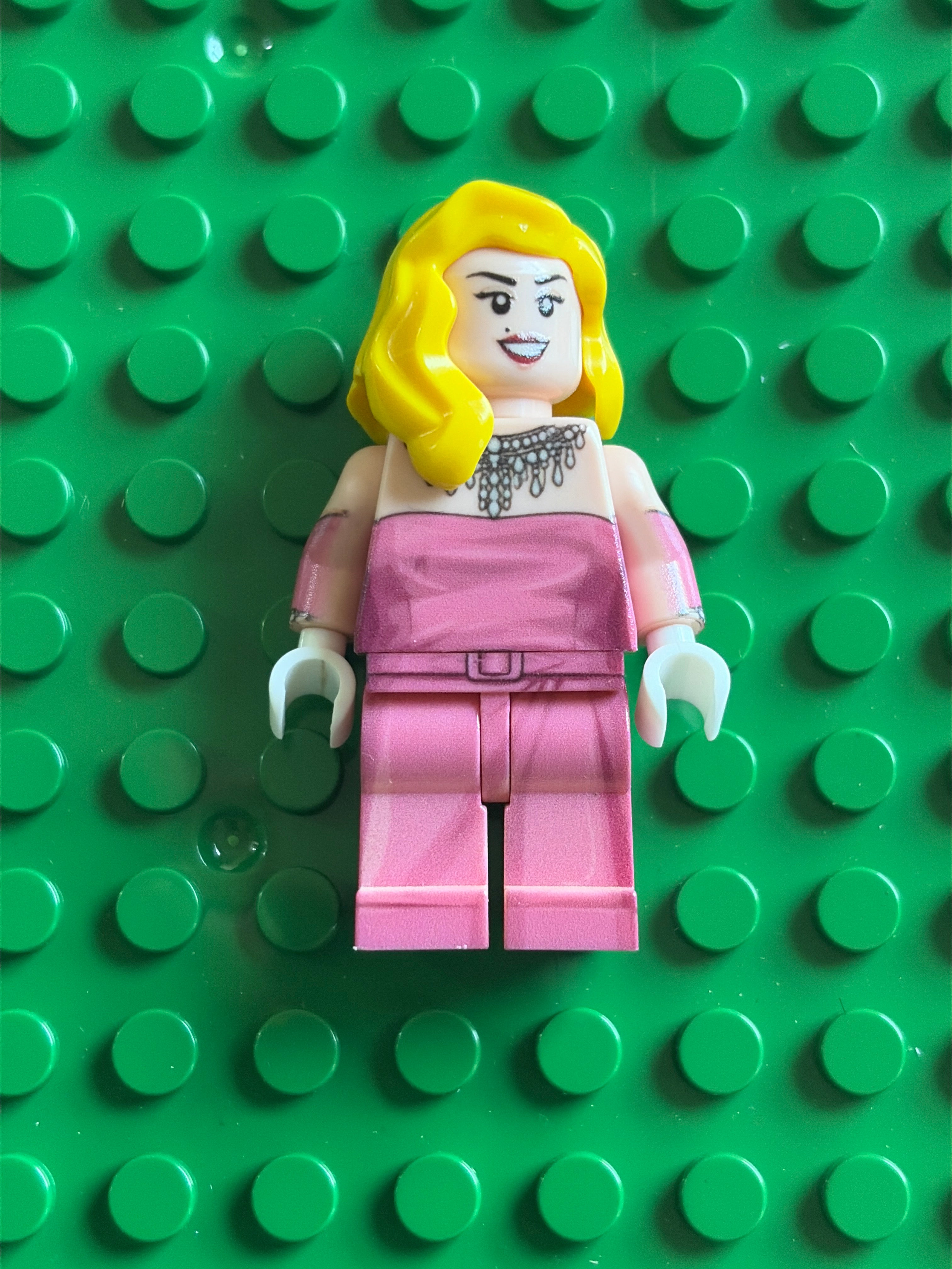 Madonna in pink off the shoulder dress from
the music video for the song vogue front view