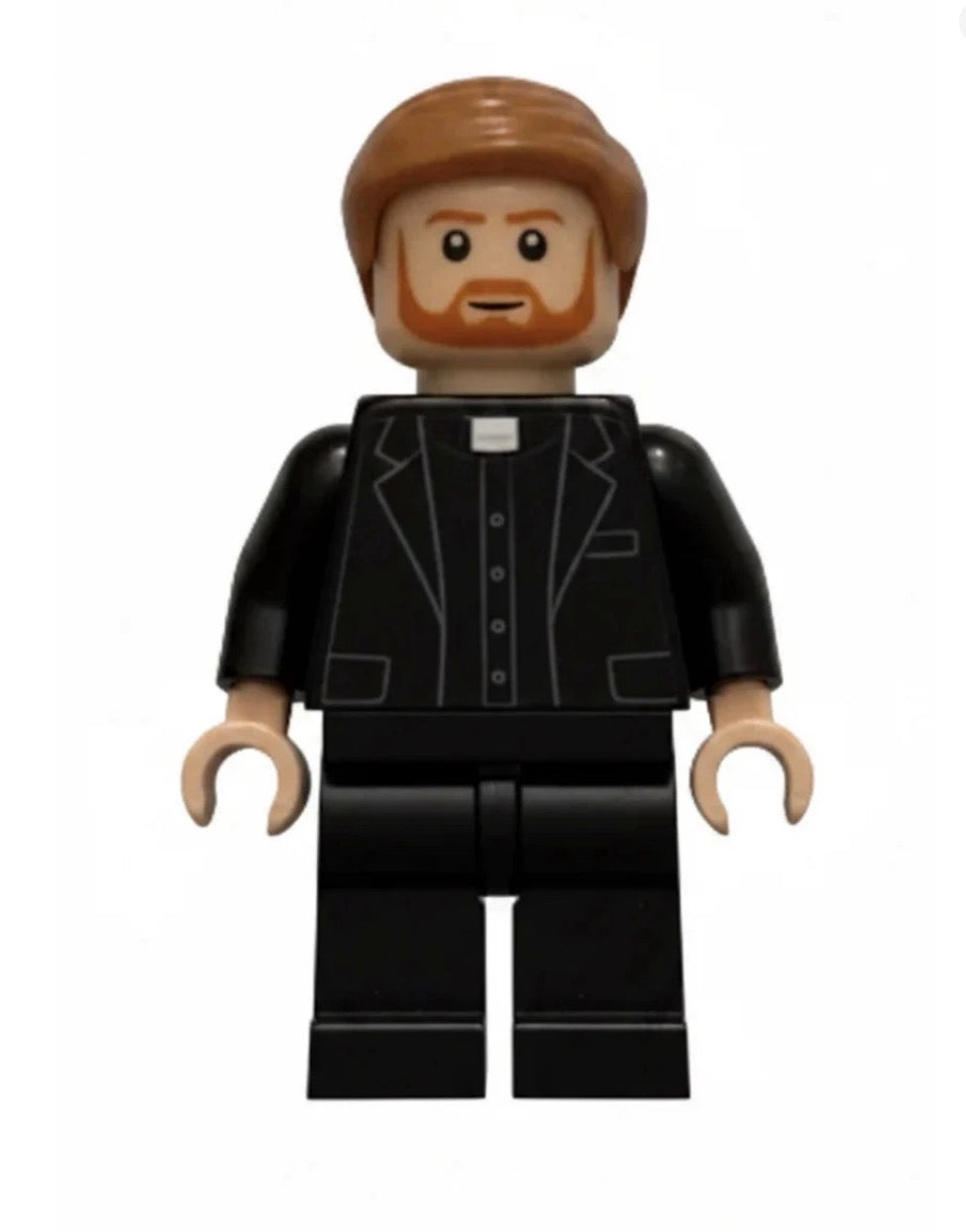 A toy minifigure with brown hair and beard, wearing a black suit and clerical collar, isolated on a white background.